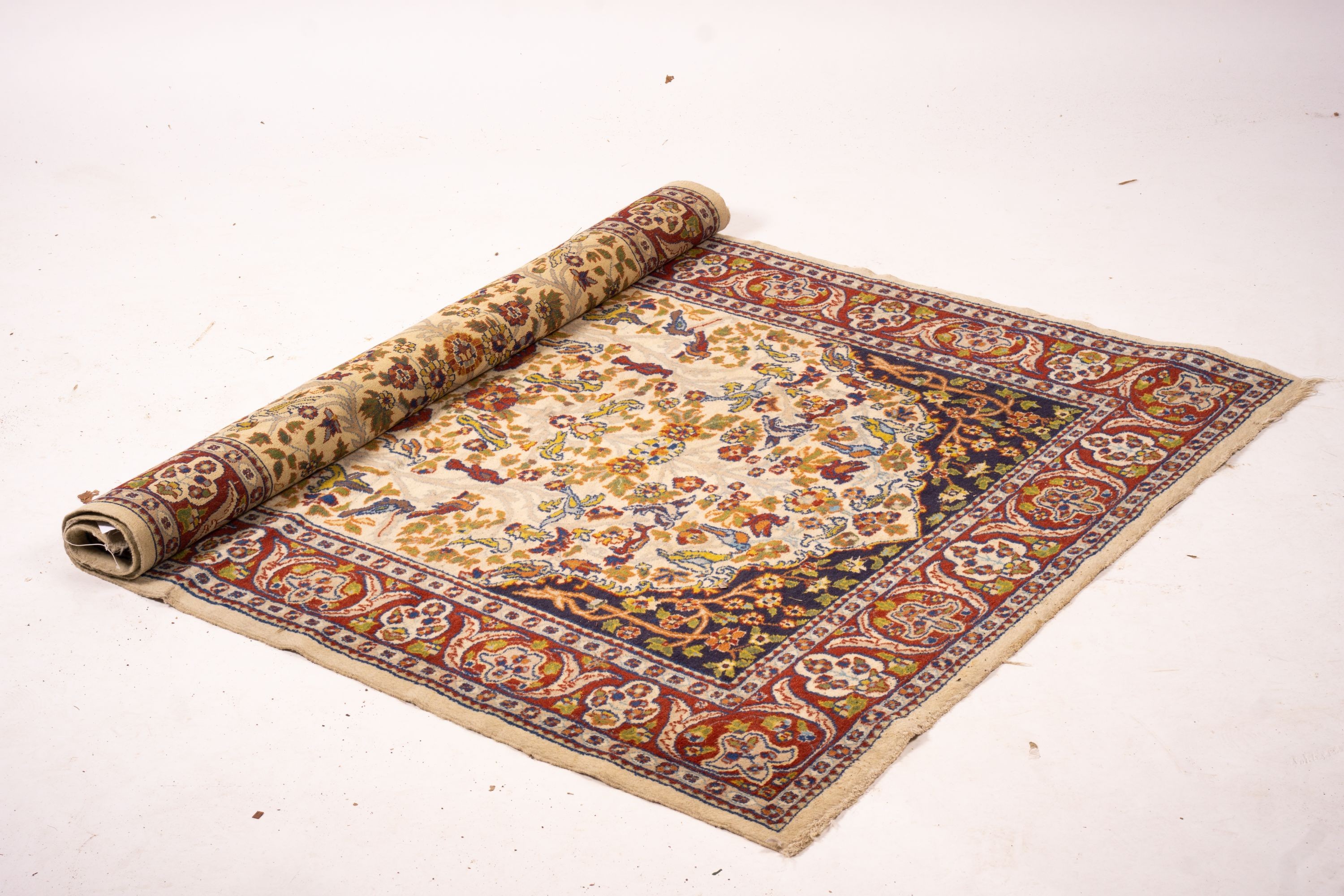 A North West Persian ivory ground 'tree of life' rug, 178 x 125cm